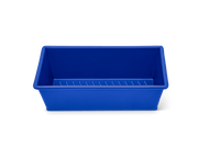 Great Jones | Breadwinner - Raspberry loaf pan with a wavy, corrugated bottom, designed for easy release and scratch resistance.