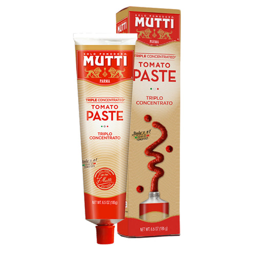 Mutti | Tomato Paste Triple Concentrated Tube, 6.5 oz, features rich, flavorful Italian tomato paste, showcased with its matching tuck-end box. Perfect for authentic culinary creations.