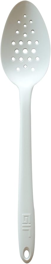 GIR | Ultimate Perforated Spoon - Studio White: A white perforated spoon with a red top, perfect for skimming and straining in the kitchen.