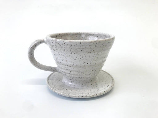 RachaelPots Coffee Pour Over Cone with handle, white speckle-glazed ceramic, on matching saucer, fits most mugs, hand-thrown in Brooklyn, microwave and dishwasher safe.