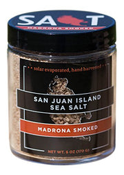 San Juan Island Sea Salt | Madrona Smoked Sea Salt jar, lid off, displaying fine, smoked sea salt crystals. A unique seasoning ideal for gourmet cooking.