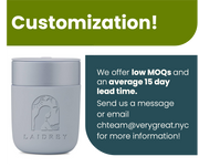 Reusable Ceramic Mug by W&P in Terrazzo Blush, 16 oz, featuring a white container with logo, splash-resistant lid, and soft-touch silicone sleeve for grip.