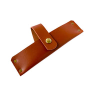 Lamson's leather sheath for a 7.25 meat cleaver, featuring a strap and gold rivets, tailored for culinary enthusiasts at Athens Cooks.