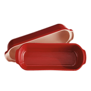 Emile Henry Loaf Bread Bakers: Long, burgundy ceramic bakeware set with a ribbed bottom and domed lid, ideal for artisan-style bread baking.