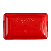 Emile Henry | Baguette Baker, Burgundy: Rectangular ceramic mold with baguettes embossed, three steam holes, and maker's logo, designed for easy homemade baguette baking.