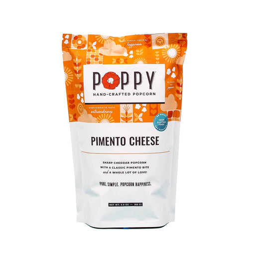 Poppy Hand-Crafted Popcorn - Pimento Cheese flavor, featuring sharp cheddar and classic pimento, showcased in a retail bag from Athens Cooks, a specialty kitchen store.