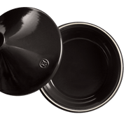 Emile Henry | Tagine, Ocean: A black ceramic tagine featuring a shallow base and conical lid, ideal for simmering stews with self-basting design, made in France.