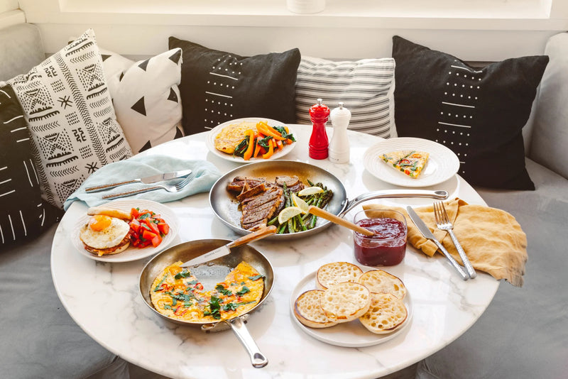 de Buyer | Mineral B Pro Carbon Steel Omelette Pan - 11 with a sleek stainless steel handle, ideal for versatile cooking and professional-grade omelettes.