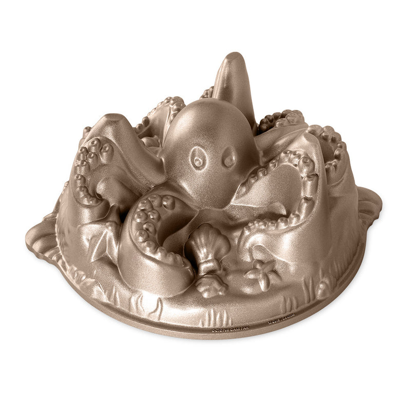 Nordic Ware Octopus Cake Pan close-up, showcasing detailed eight curling limbs and seashells for creating intricate under-the-sea themed cakes, crafted from cast aluminum with nonstick coating.