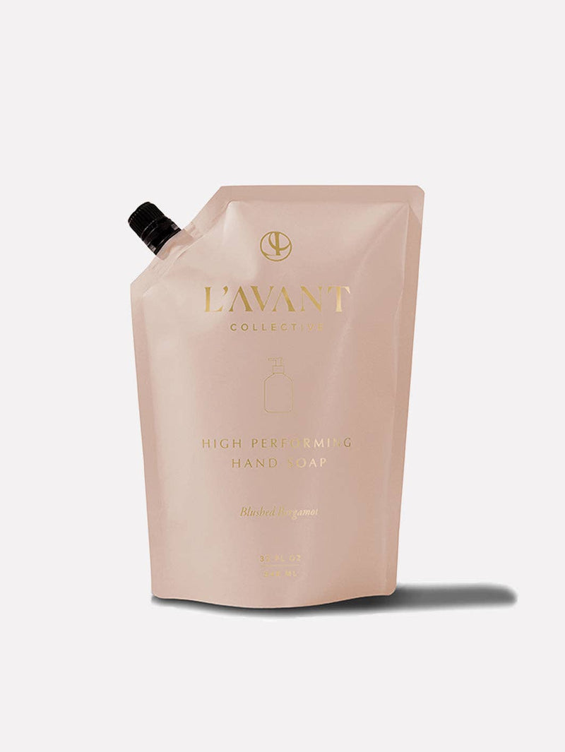 L'AVANT Collective - Hand Soap Refill Pouch Blushed Bergamot, 32 fl. oz., eco-friendly, blush-pink pouch with a black spout, offering a luxurious wash experience.