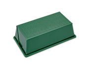 Great Jones | Breadwinner - Raspberry loaf pan with text, featuring a wavy, nonstick, ceramic-coated surface for easy release of baked goods.