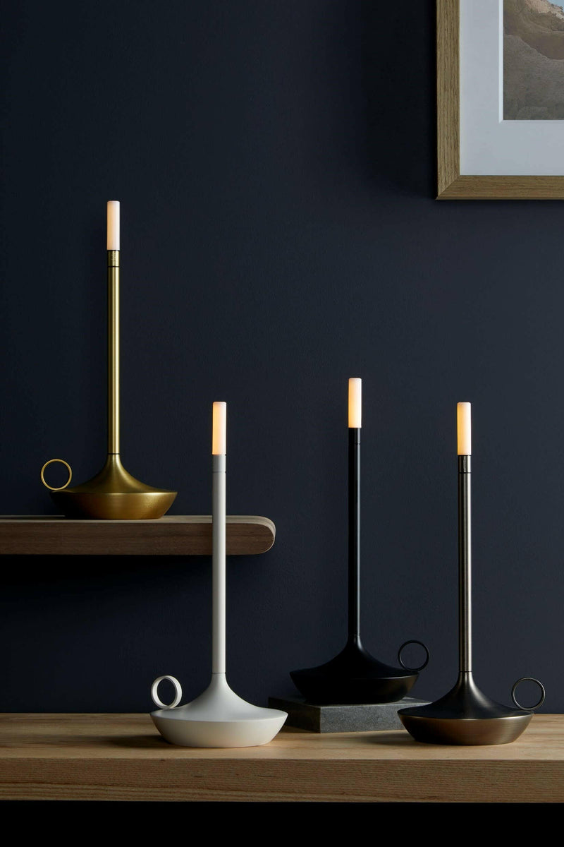 VANMOKUM | GRAYPANTS Wick Portable Rechargeable Lamp, ideal for creating ambiance, displayed on a wooden surface, blending candle romance with flashlight utility.
