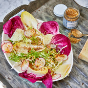 Villa Jerada - Dukkah - 50g featured with a composed salad, highlighting the blend's perfect seasoning role alongside Belgian endive, radicchio, and Parmesan.