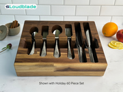 Loudblade - Custom Solid Walnut Wooden Flatware Drawer Organizer showcasing a holiday 60-piece set, on a marble surface with fruit and spices nearby.