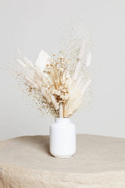 Idlewild Floral Co. - Snow Dried Flower Bouquet in a white vase, featuring preserved botanicals like pampas plumes and bunny-tail grasses, perfect for elegant home decor.