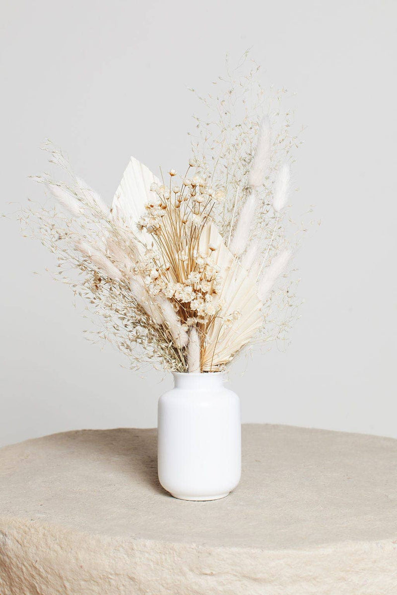 Idlewild Floral Co. - Snow Dried Flower Bouquet in a white vase, featuring preserved botanicals like pampas plumes and bunny-tail grasses, perfect for elegant home decor.