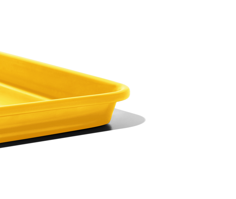 Great Jones | Holy Sheet - Pepper, a versatile half-sized sheet pan with nonstick ceramic coating, ideal for easy cleanup and stylish enough for table presentation.