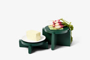 Areaware - Pedestal Set - Green showcasing radishes and butter, crafted from beechwood, ideal for elegant kitchen displays or culinary presentations.