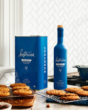 Kosterina - Organic Everyday Extra Virgin Olive Oil Tin (3L) beside cookies on a counter, ideal for cooking and baking.