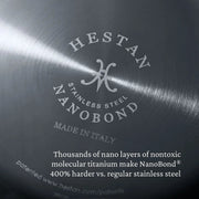 Close-up of Hestan | Cookware, .75qt Butter Warmer Pan, highlighting the Nanobond stainless-steel base with Hestan logo, emphasizing its durable, non-toxic titanium construction.