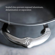 Hestan | Titanium Essential 5-Piece Cookware Set lid with polished handle and sealed rim, showcasing durable construction and innovative Molecular Titanium technology.