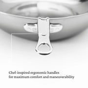 Close-up of Hestan NanoBond 14 Titanium Chef's Pan handle, showcasing its ergonomic design for comfort and maneuverability in high-performance cooking.