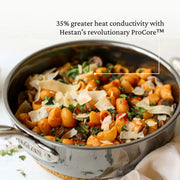 Hestan | Cookware, 2qt Saucier Pan + Lid with conchiglie pasta, mushrooms, and greens, showcasing 35% greater heat conductivity through ProCore™ technology.