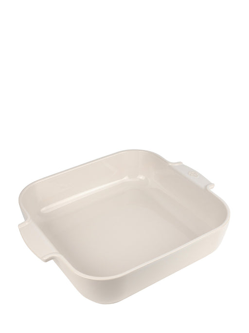Peugeot | Appolia Square Baking Dish 14 inches, Ecru, made from durable ceramic, features integrated handles for easy lifting, ideal for even cooking and serving.