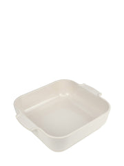 Peugeot | Appolia Square Baking Dish 11 inches, Ecru, with built-in handles, ideal for easy oven-to-table serving, featuring durable anti-abrasion glaze and heat resistance.