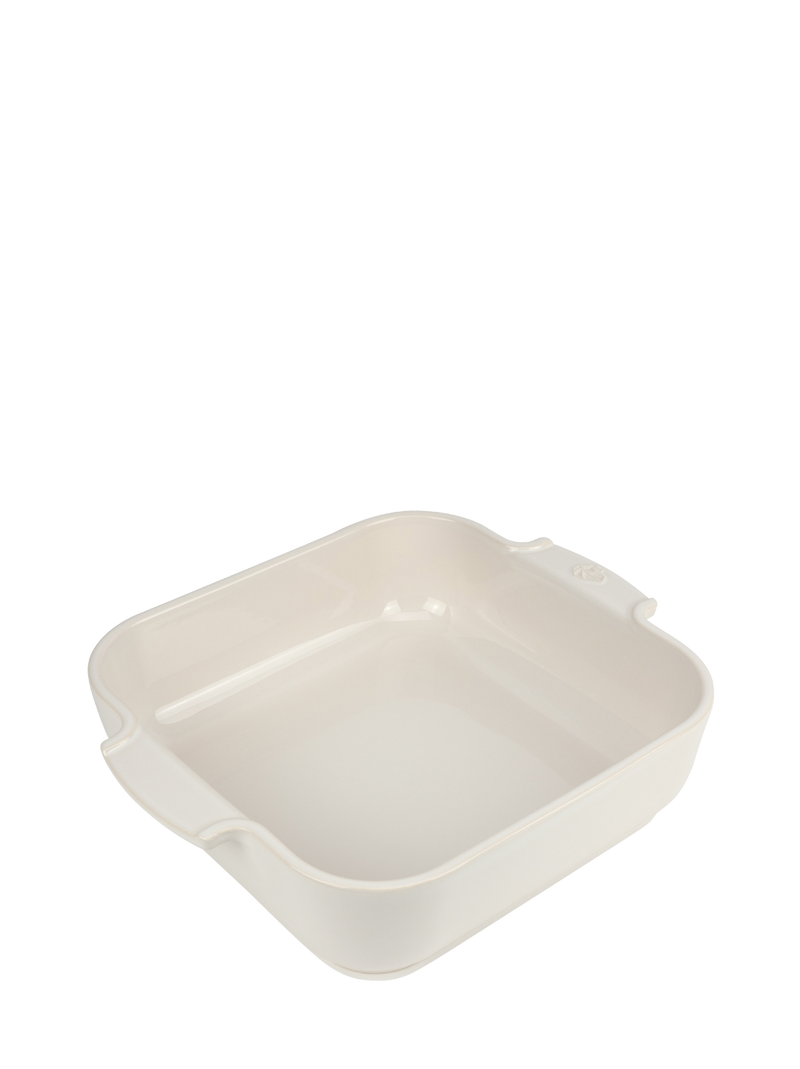 Peugeot | Appolia Square Baking Dish 11 inches, Ecru with integrated handles, ideal for casseroles and roasts, featuring anti-abrasion glaze and heat resistance.
