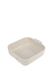 Peugeot | Appolia Square Baking Dish 8 inches, Ecru, ideal for even cooking. Features integrated handles for easy handling, perfect for casseroles or gratins.