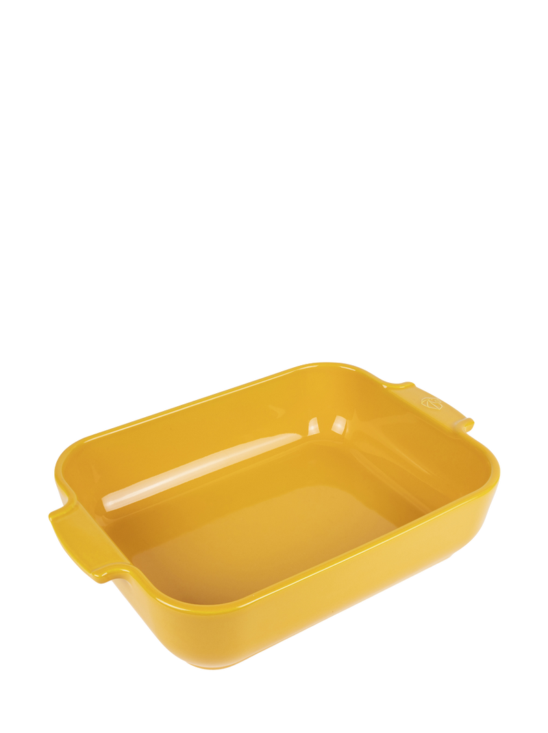 Peugeot | Appolia Rectangular Baking Dish, Saffron Yellow: An empty, yellow ceramic baking dish with small handles, ideal for versatile cooking.