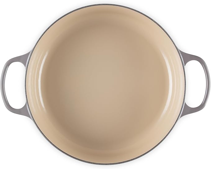 Le Creuset | Signature Round Wide Oven - Oyster, empty round enameled cast-iron pot with loop handles, ideal for versatile cooking and direct table serving.