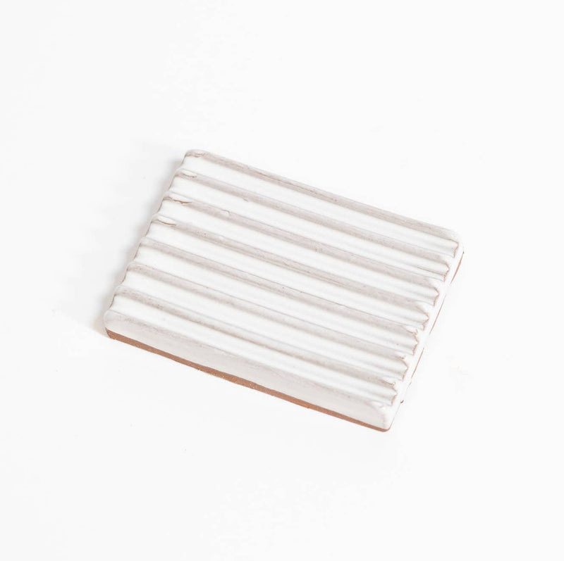 Gravesco Pottery - Soap Dish | White: Handmade ceramic dish with ridged white glaze, terracotta base; keeps soap dry. Crafted in Indianapolis, measures 3x4 inches.