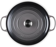 Le Creuset | Signature Round Wide Oven - Oyster, top-down view showing lid with concentric-ring design, side handles, and metal knob, ideal for versatile cooking and serving.