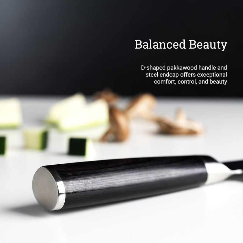Shun | Classic Starter Set Ebony, 3 Pc: Close-up of the D-shaped pakkawood handle with steel endcap, highlighting comfort and control, ideal for versatile kitchen use.