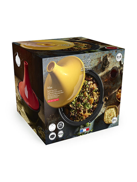 Peugeot | Appolia Atlas Tagine, Saffron Yellow: Conical-lid ceramic pot with stew, spices, and sides. PFAS-free, 10-year guarantee, 30 cm, serves 6-8, eco-friendly aluminum base.