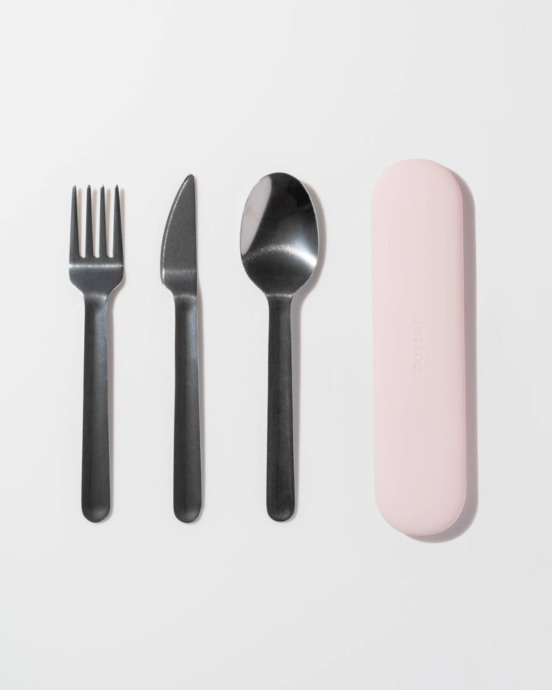 W&P - Stainless Steel Utensils Set in Silicone Carry Case: Terrazzo Charcoal, featuring a fork, spoon, and knife with a sleek pink carrying case.