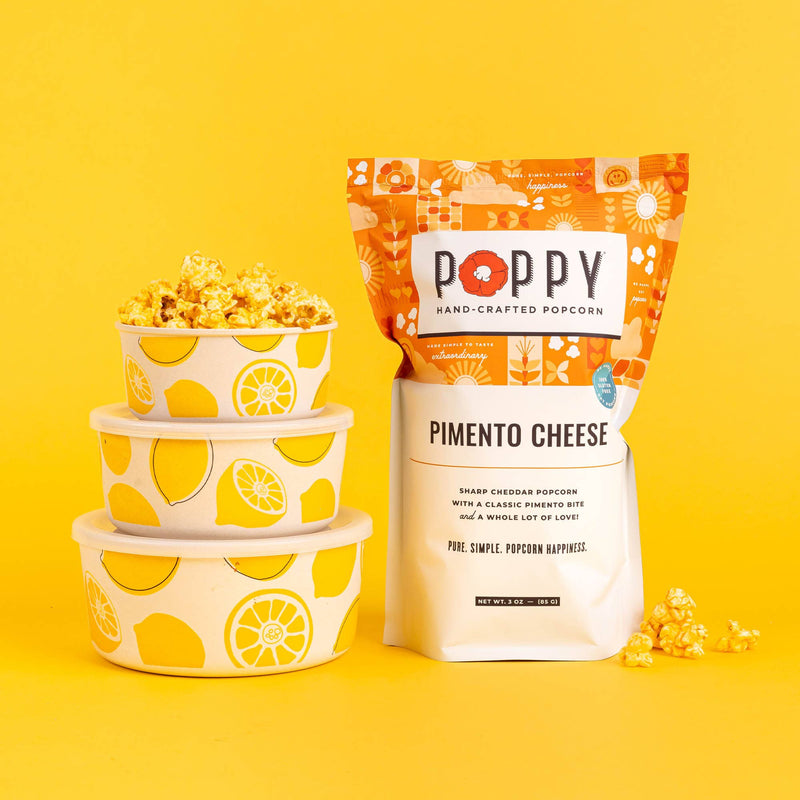 Poppy Hand-Crafted Popcorn - Pimento Cheese in stackable bowls with lemon design, highlighting its savory, cheesy flavor. A perfect Southern-inspired treat from Athens Cooks.