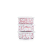 Crow Canyon Home - Splatter Enamelware 3-pc Storage Bowl Set features three pink-and-white marbled enamel bowls, each with a white lid, perfect for entertaining.