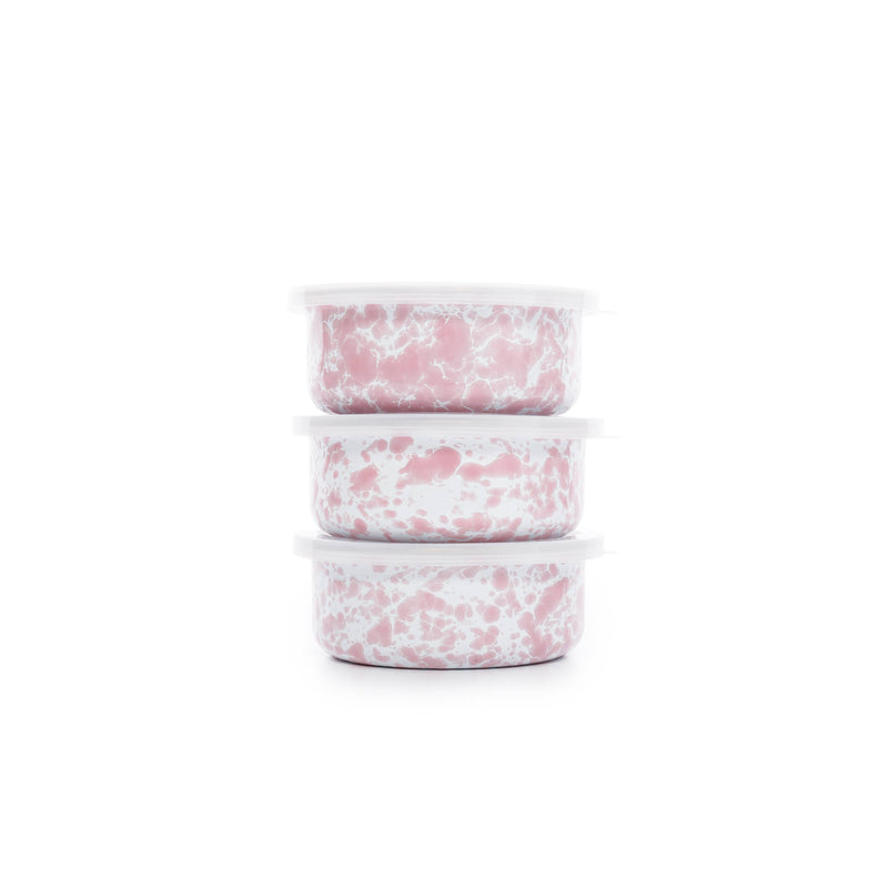Crow Canyon Home - Splatter Enamelware 3-pc Storage Bowl Set features three pink-and-white marbled enamel bowls, each with a white lid, perfect for entertaining.