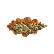 Bordallo Pinheiro | Gudrun Plate: A ceramic dish shaped like a leaf with raised veins, glazed in rustic tones, perfect for autumnal table settings.