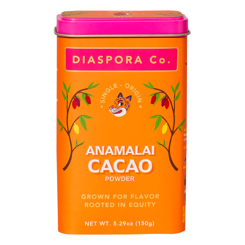 Diaspora Spices Co. - Anamalai Cacao (Powder) in a vibrant tin features cacao pods, emphasizing single-origin, minimally processed cacao for rich flavor and natural nutrients.