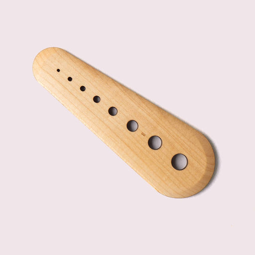 Collin Garrity - Herb Stripper: Maple, features a wooden gauge with holes for herb stripping and seed scraping, ideal for kitchen tasks. Limited-release, handmade in St. Louis.