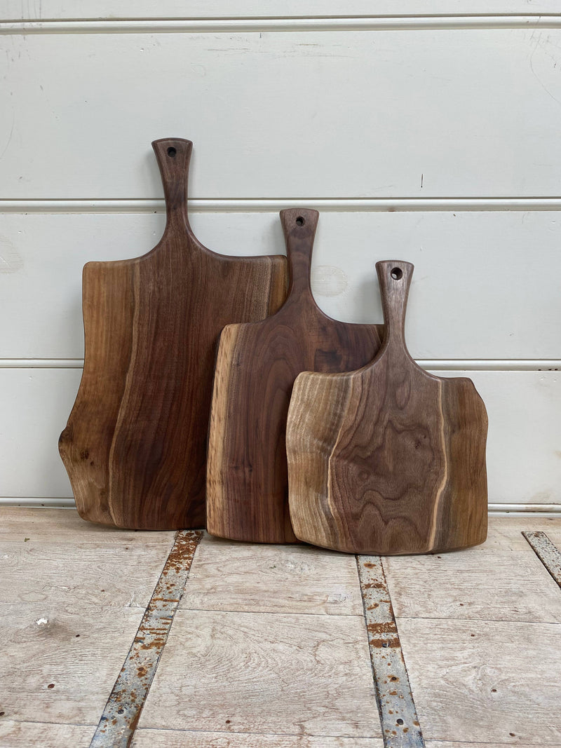 Petermans Boards and Bowls Inc. - 24 black walnut serving board with handle, handcrafted and sustainably sourced, perfect for serving or cutting in any kitchen.