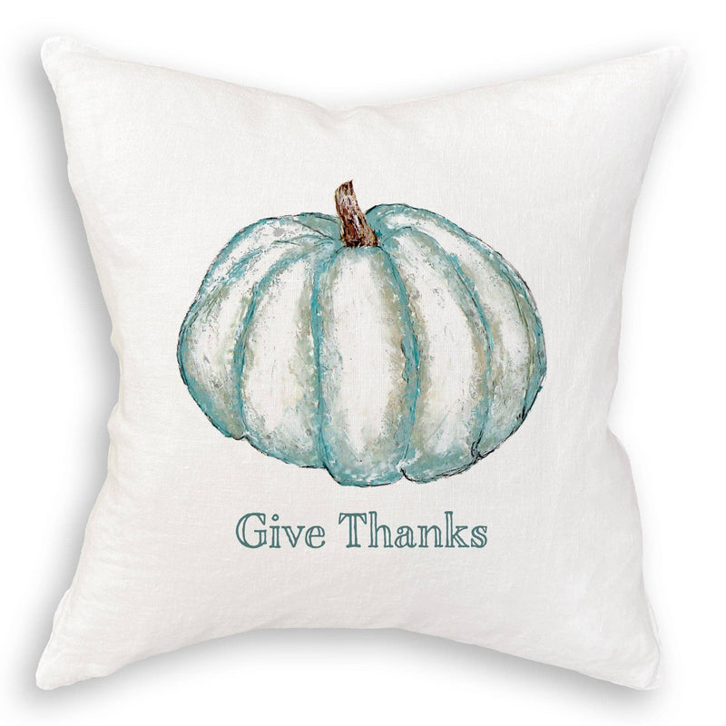 French Graffiti - Blue Pumpkin throw pillow featuring a watercolor pumpkin and Give Thanks text, perfect for adding warmth to your kitchen or dining space.