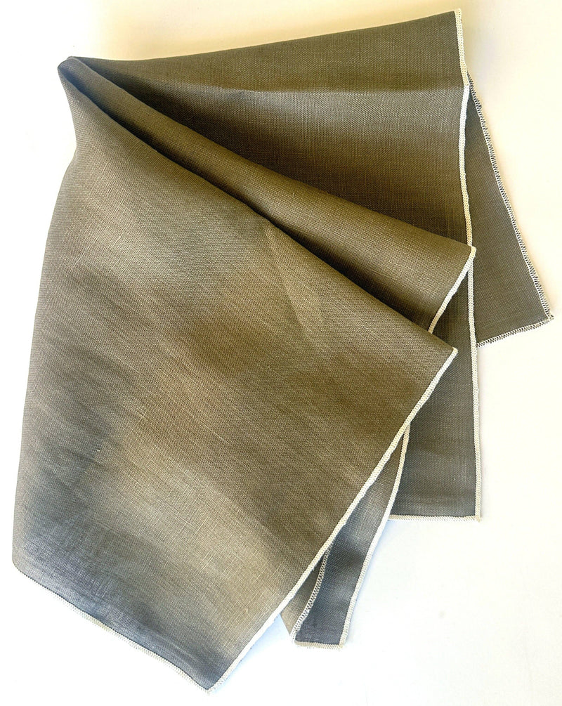 Tisch New York - Napkins, Earth Linen (Cream Hem) featuring a muted gray/olive tone, neatly folded with serged edges, 18.5 square, sold in sets of four.