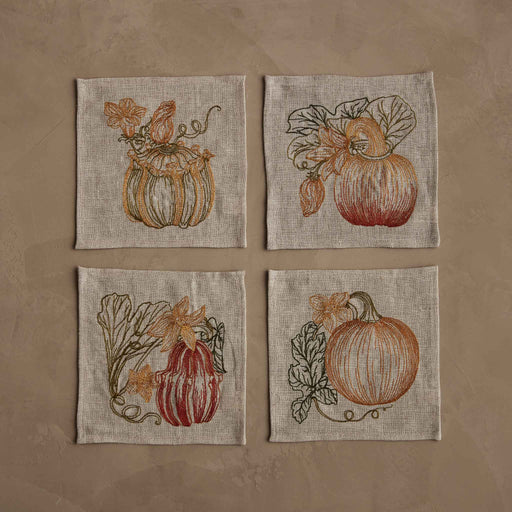 Coral & Tusk - Pumpkin Patch Cocktail Napkin Set: Four embroidered linen-blend napkins with unique pumpkin designs, ideal for enhancing autumnal table settings.