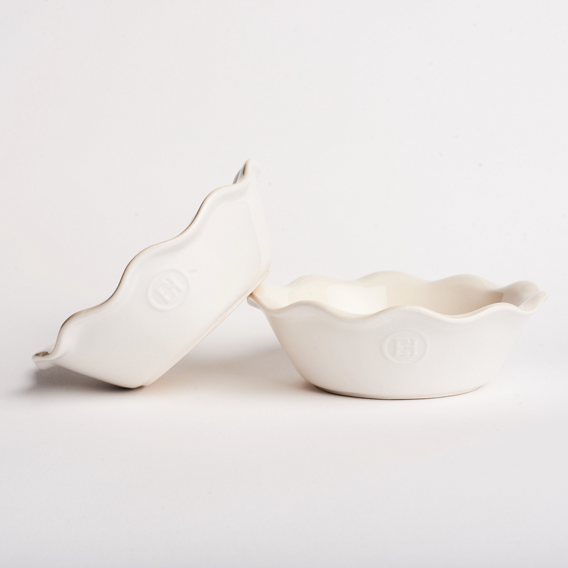 Emile Henry | Modern Classics Mini Pie Dish featuring two white ceramic dishes with scalloped rims and embossed EH emblem, perfect for individual pie servings.
