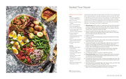 Penguin Random House LLC - By Heart: A cookbook spread featuring a Smoked Trout Niçoise salad recipe, highlighting home-cooked, restaurant-quality meals.